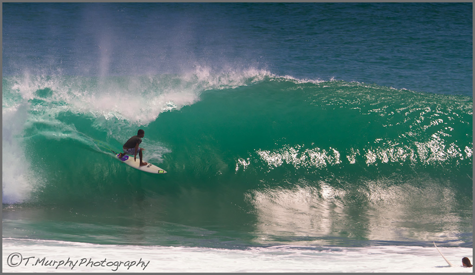 The locals on Bali seem to get better every time I visit.  Agust Broww (Blackie) pulling in at the main peak, Uluwatu.
